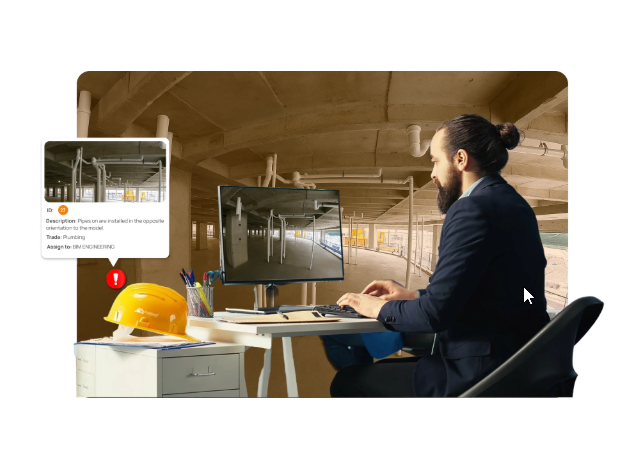 Person viewing 360 capture on monitor